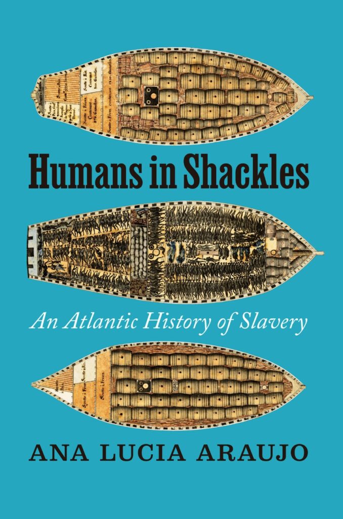 Book cover titled "Humans in Shackles: An Atlantic History of Slavery" by Ana Luchia Araujo. The cover includes drawings of slave ships.